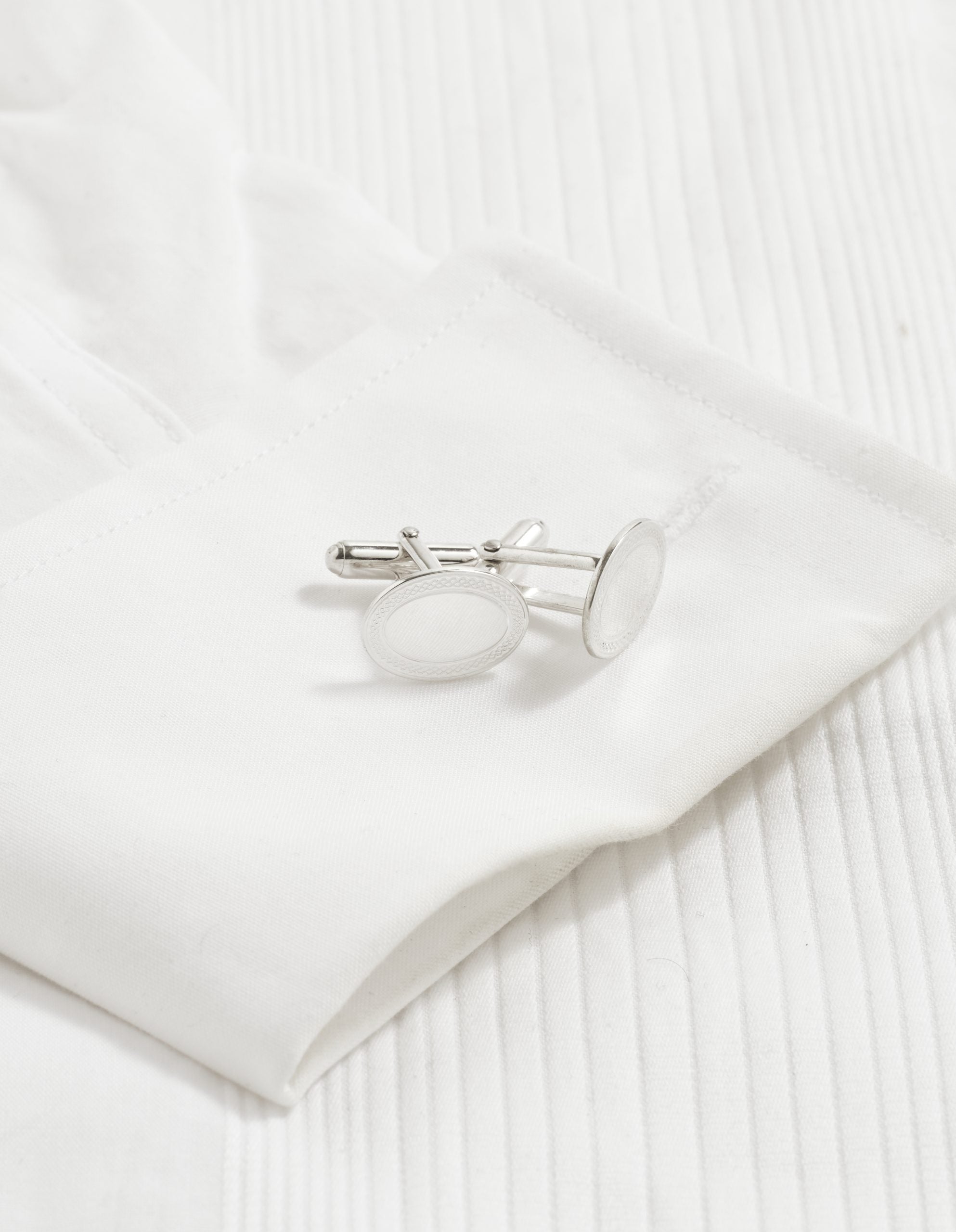 Polished Rhodium Plated Sterling Silver Oval Cufflinks with Engine Turn Frame