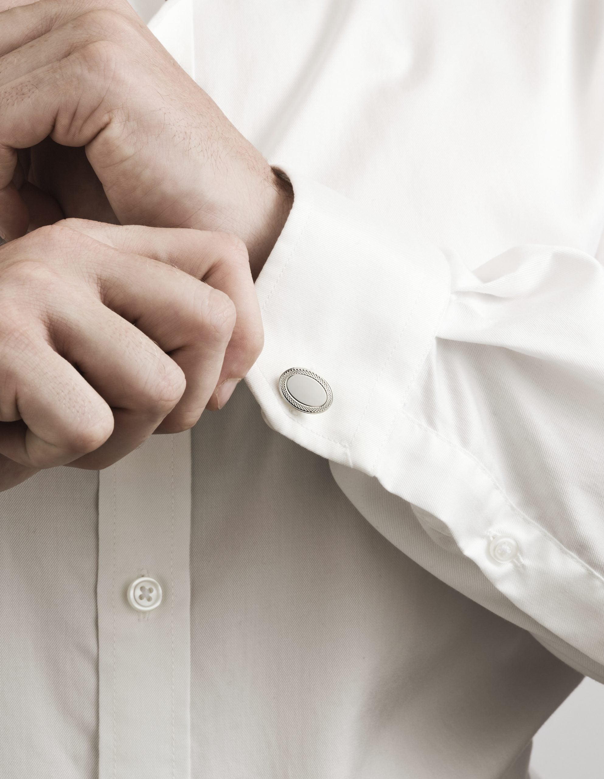 Polished Rhodium Plated Sterling Silver Oval Cufflinks with Engine Turn Frame