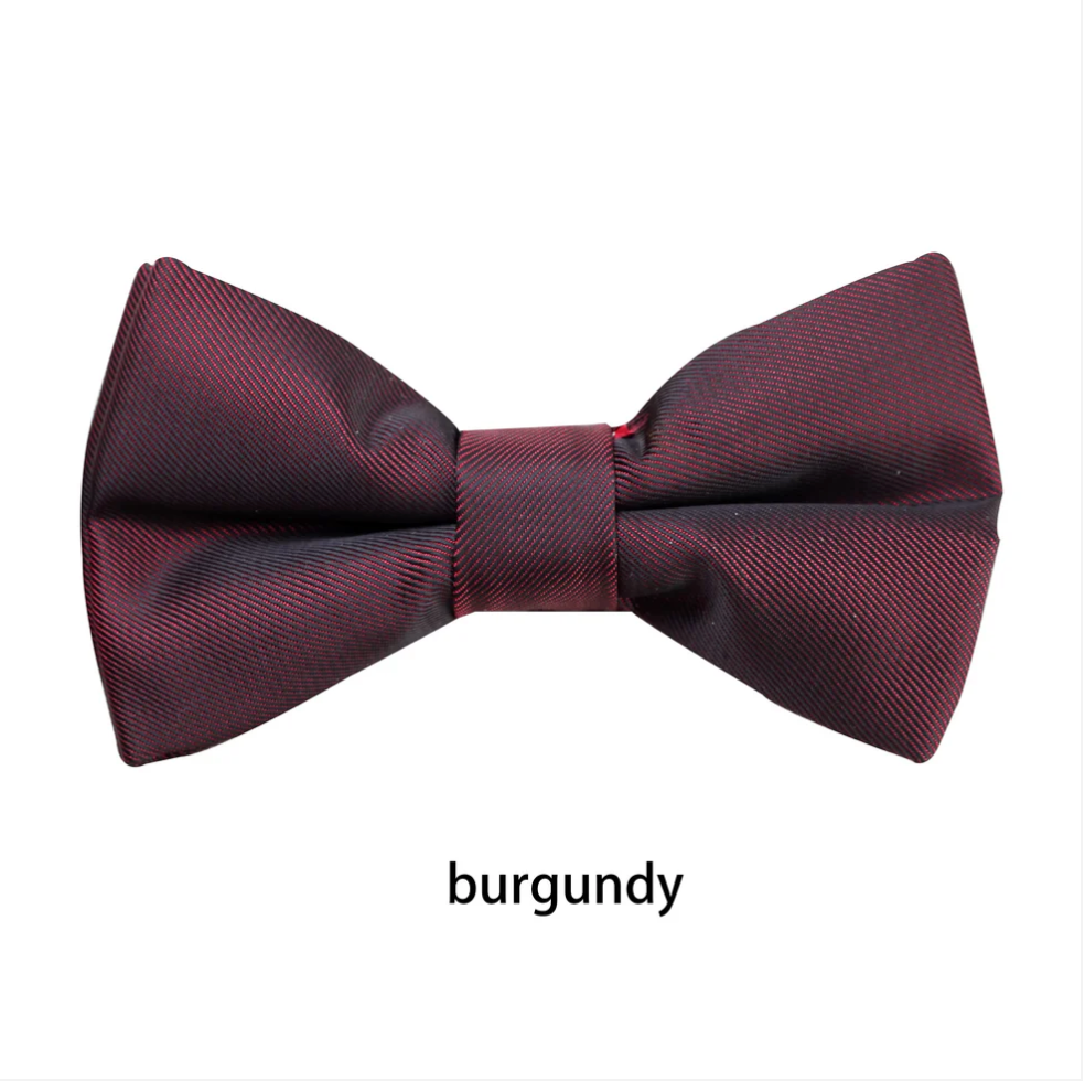**Boys Matte Bow Tie**

Complete the perfect formal look with our classic Boys Matte Black Bow Tie. Featuring a sophisticated matte finish, it's the ideal accessory for weddings, school formals, page boys, black-tie events, and special occasions.

* Elegant matte finish for a modern look
* Bow measures **8.5cm** across
* Adjustable neck strap with a **full length of 45cm**
* Comfortable, secure fit
* A timeless finishing touch for every young gentleman

Smart, stylish, and easy to wear—an essential ac