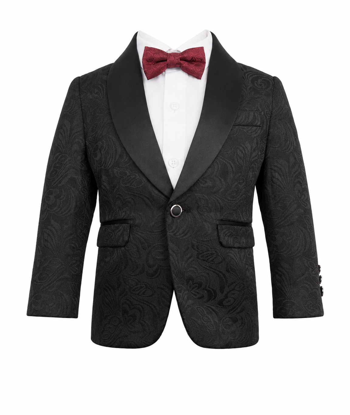 A boy's formal tuxedo jacket in black textured jacquard with satin shawl lapels, styled with a white dress shirt and a burgundy bow tie on a white background.